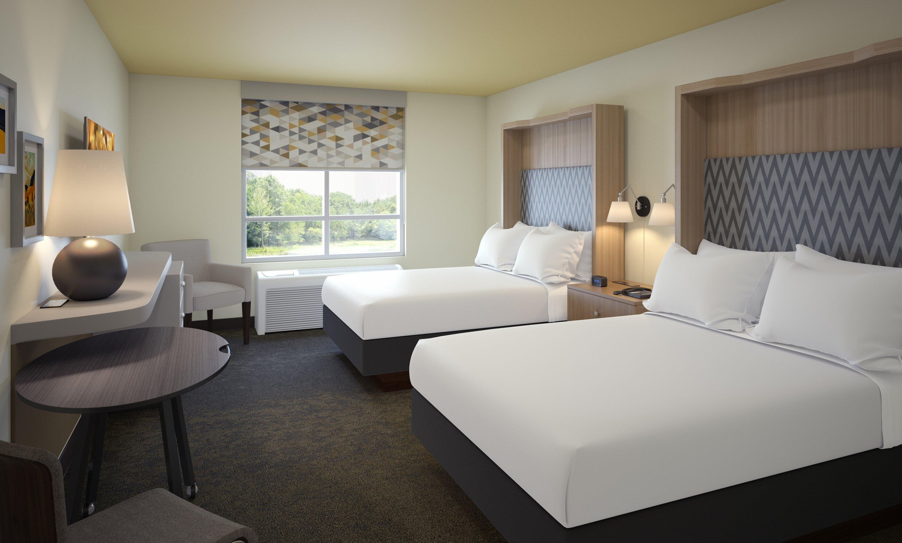 Premium bedding, down comforters, pillowtop beds, desk