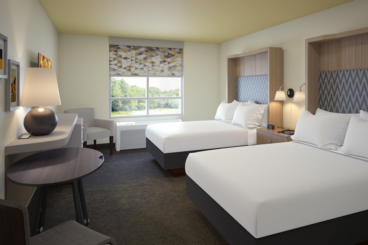 Premium bedding, down comforters, pillowtop beds, desk