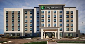A Holiday Inn Express & Suites hotel with a modern facade, multiple floors, and a central entrance. - Holiday Inn Express and Suites Brantford by IHG (Brantford)