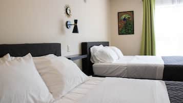 Room, 2 Queen Beds | Iron/ironing board, free cribs/infant beds, free WiFi, bed sheets