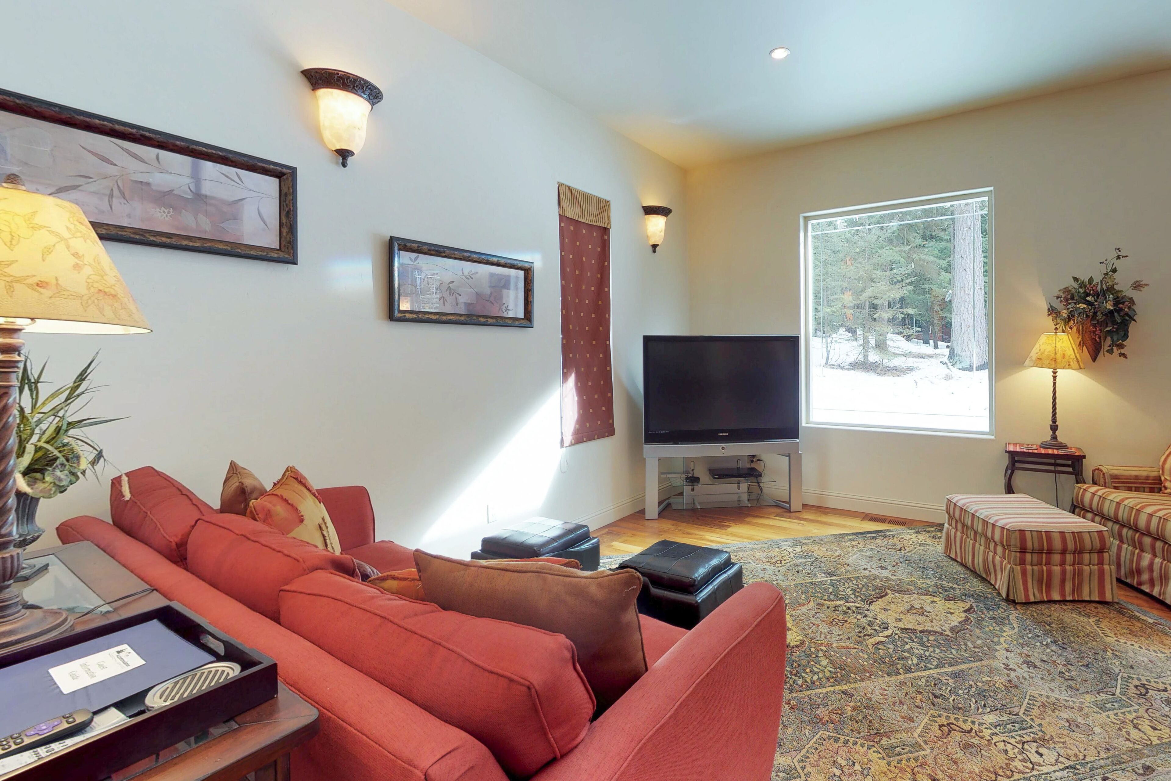 Centrally located home with deck, pool, hot tub & tennis
