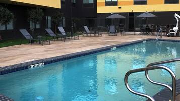 Outdoor pool, open 9 AM to 10 PM, sun loungers