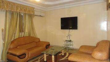Apartment, 3 Bedrooms | Living area | TV