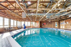 Indoor pool - Waterfront Condo with Private Deck, Bay Views, Pool, Hot Tub, & Sauna (Newport)