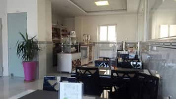 Breakfast, lunch, dinner served; local and international cuisine