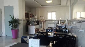 Breakfast, lunch, dinner served; local and international cuisine 