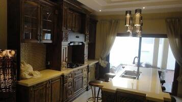 Villa | Private kitchen | Fridge, microwave, oven, coffee/tea maker