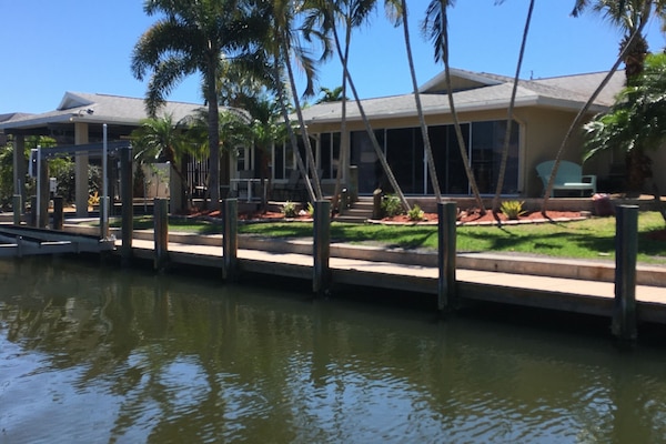 View of the back of the home from the water. Lots of docking space for friends!