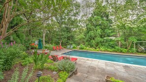 A heated pool, pool loungers - Spacious Living Areas, Lovely Landscaping, Close to Bay Beaches and East... (East Hampton)