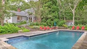 A heated pool, pool loungers - Spacious Living Areas, Lovely Landscaping, Close to Bay Beaches and East... (East Hampton)