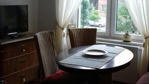 Family Apartment, 1 Bedroom (LARA 1.OG +20€ cleaning fee per stay) | Living room | Flat-screen TV, fireplace - Apartment - Colorful House (Erfurt)