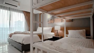 Premium bedding, blackout curtains, soundproofing, WiFi