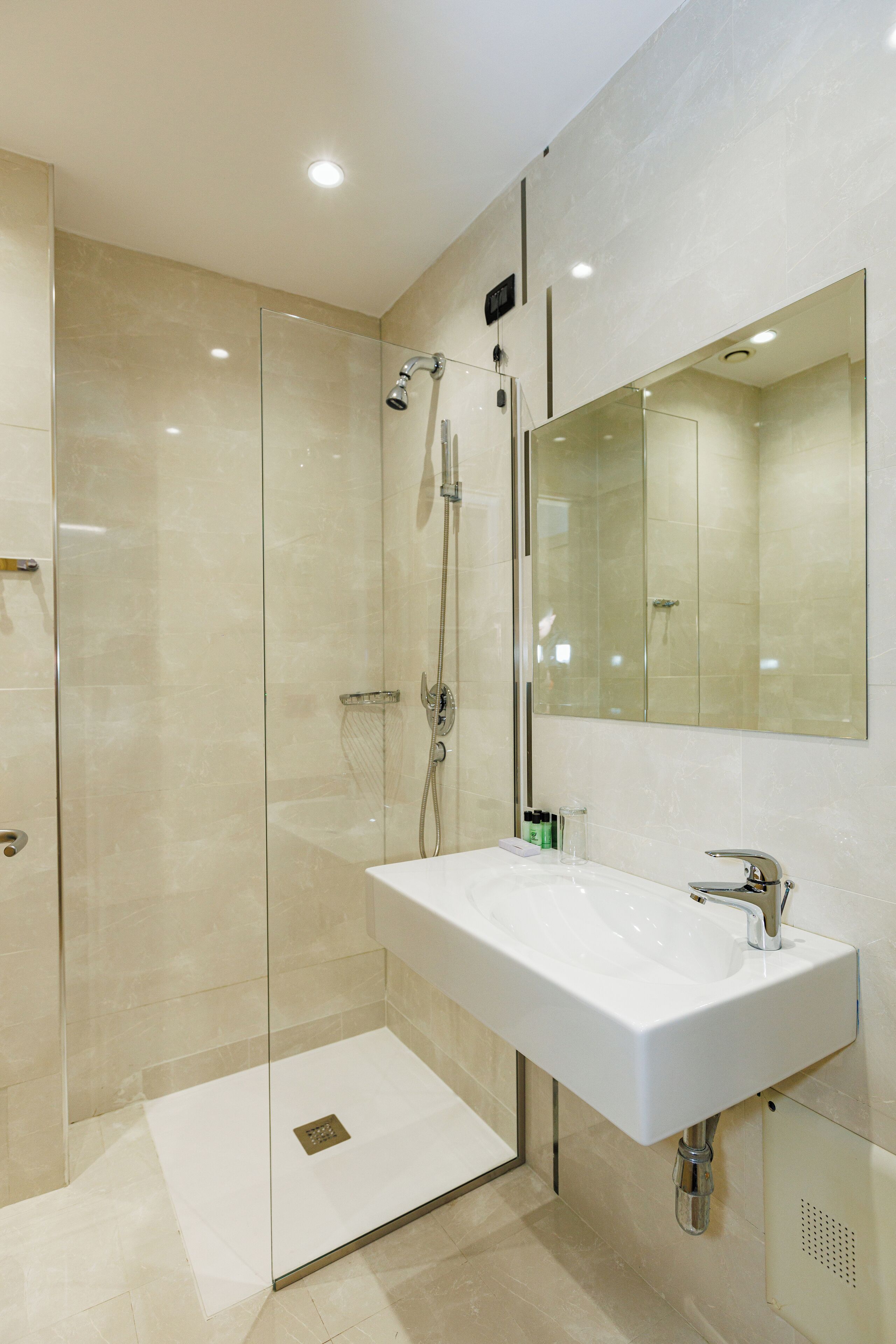 shower, hair dryer, bathrobes, slippers