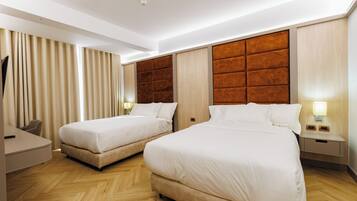 Family Quadruple Room | 1 bedroom, Frette Italian sheets, premium bedding, minibar