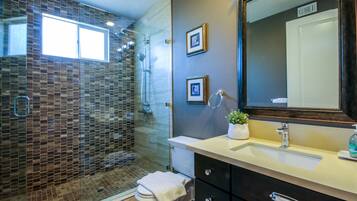 Bathtub, jetted bath, hair dryer, towels