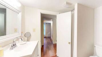 Bathtub, hair dryer, towels