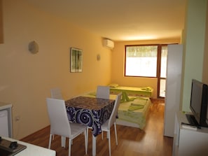 Studio (3 people ) | Living area | Flat-screen TV - Fantasy Apartments (Varna)