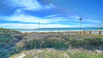 On the beach, sun loungers, beach towels