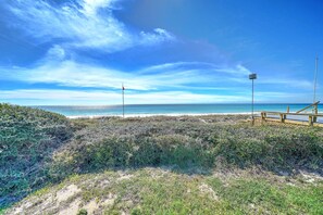 On the beach, sun loungers, beach towels