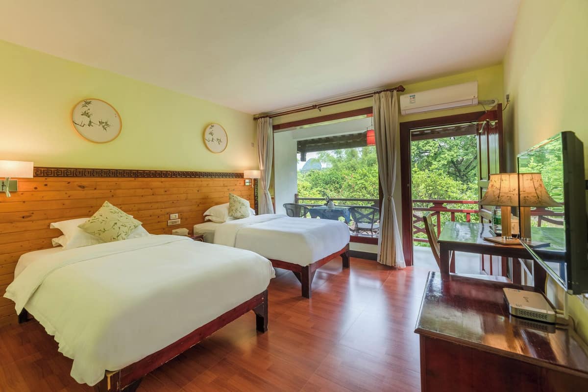 Classic Twin Room, Pool View | Desk, blackout drapes, soundproofing, free cribs/infant beds