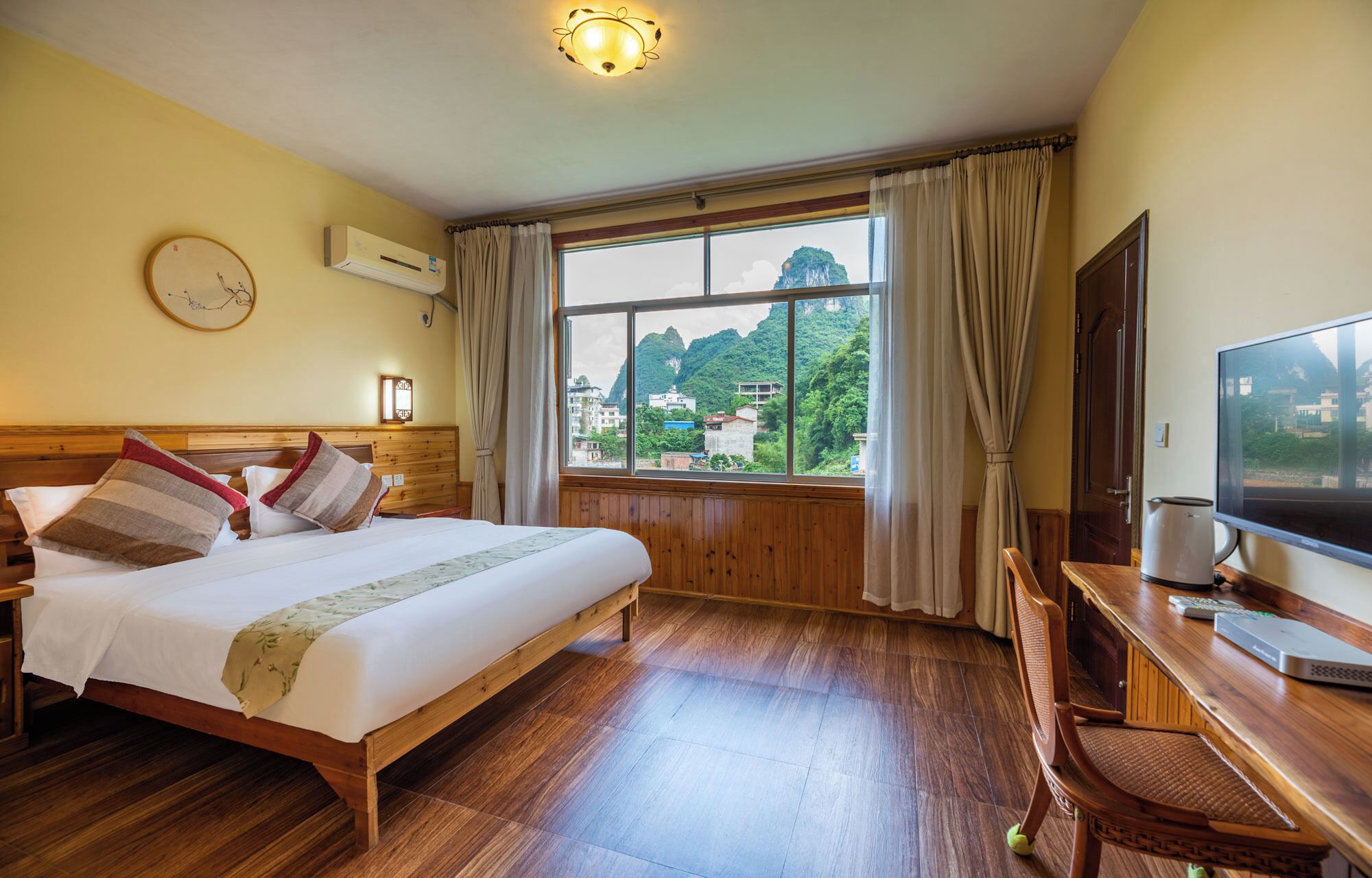 Desk, blackout drapes, soundproofing, free cribs/infant beds