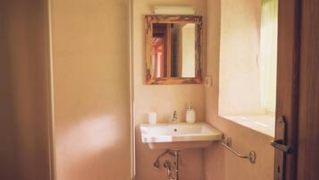 Shower, eco-friendly toiletries, hair dryer, bidet