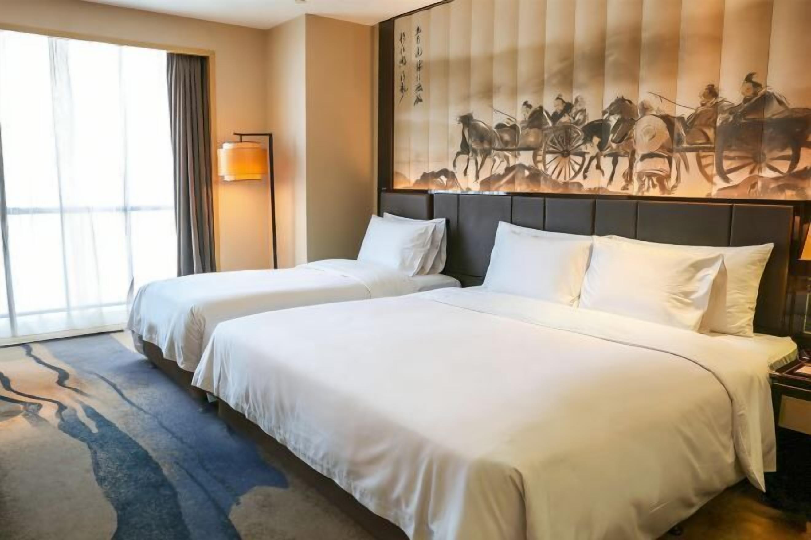 Hypo-allergenic bedding, down duvets, minibar, in-room safe