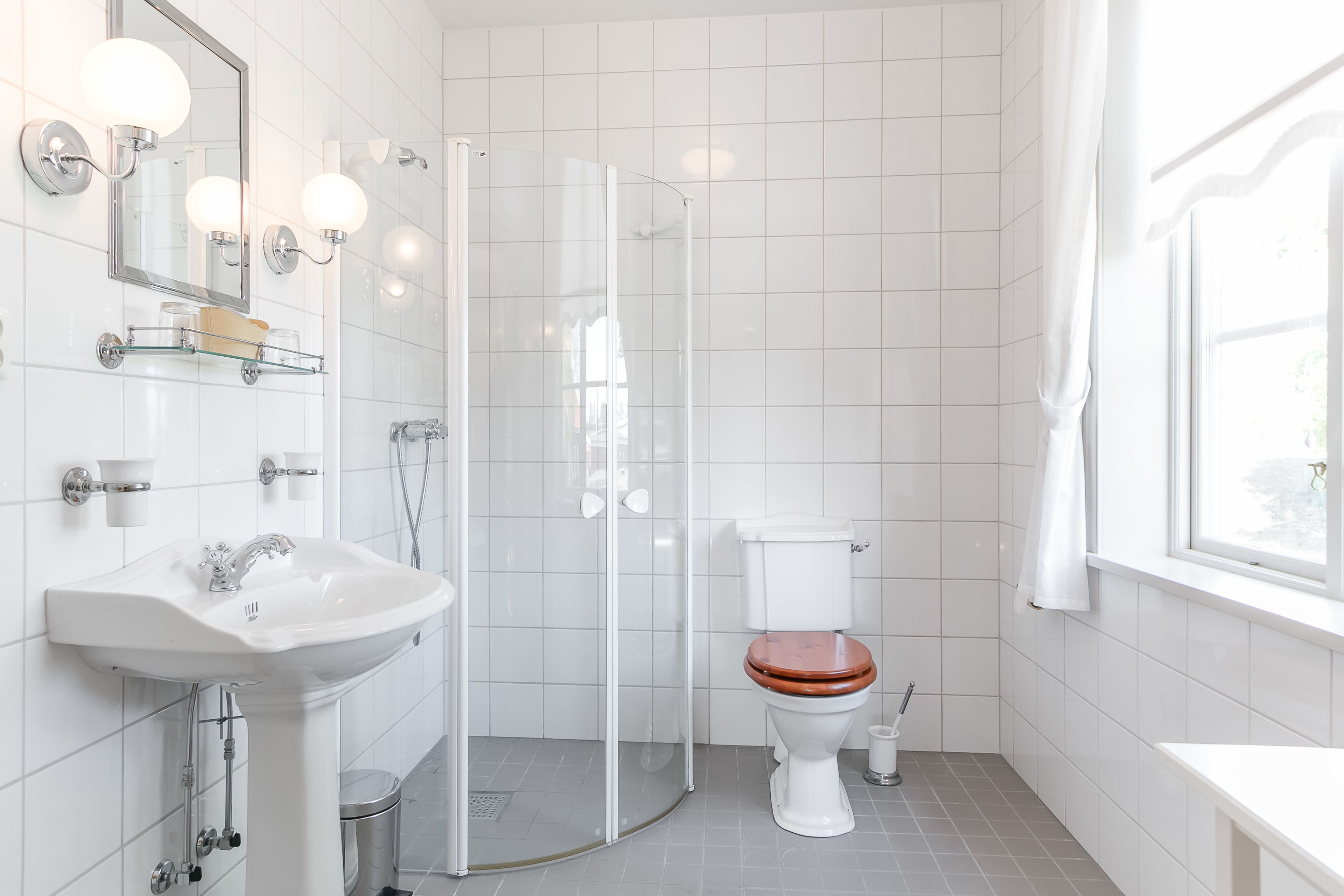 superior twin room, garden view | bathroom | designer toiletries, hair dryer, towels