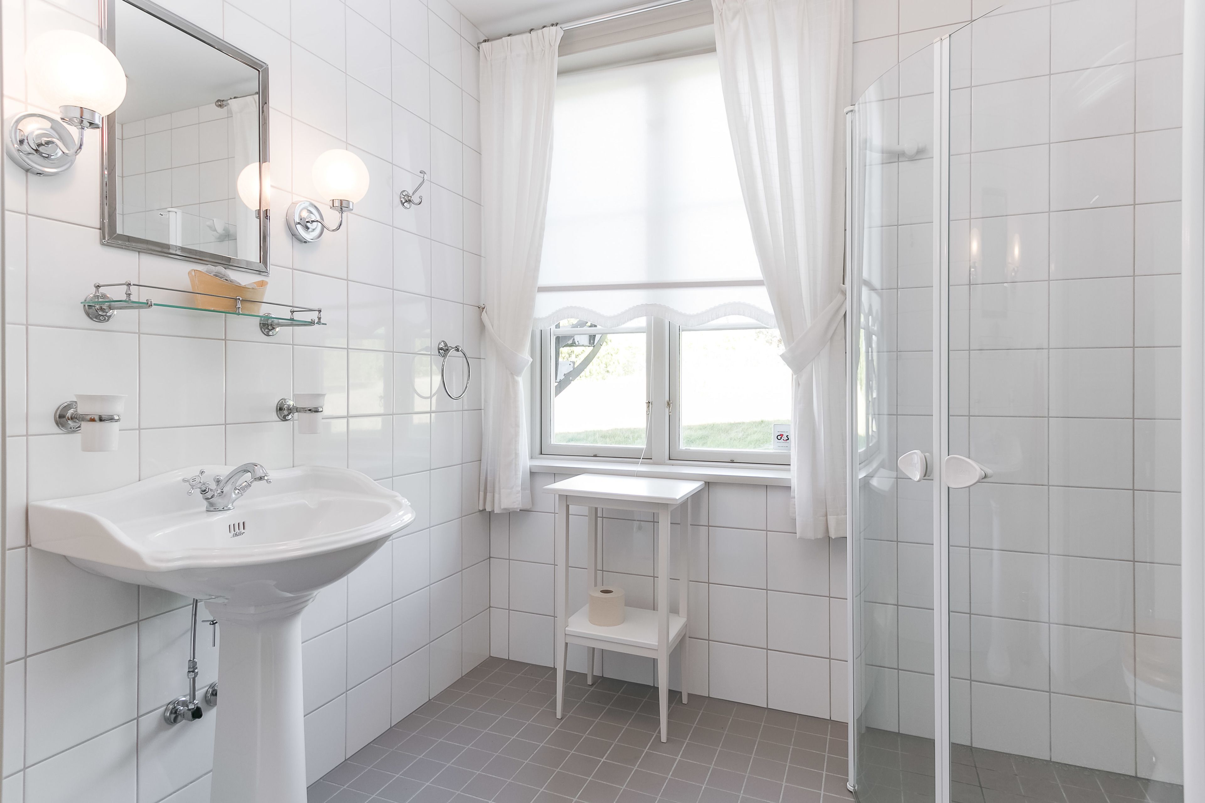 superior twin room, garden view | bathroom | designer toiletries, hair dryer, towels