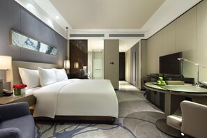 Premium bedding, down comforters, minibar, in-room safe