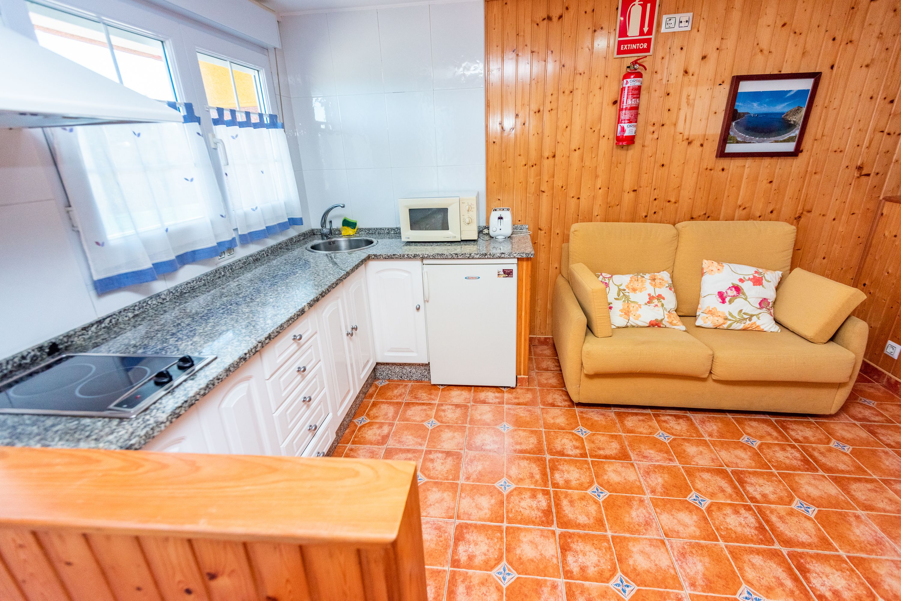 traditional studio | living area | 32-inch flat-screen tv with cable channels, tv