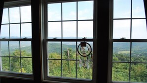 Three windows with a view of a forested landscape. - Spectacular Views, Swimming Pool, Hot Tub, Real Log Fires, Mountain Getaway (Rileyville)