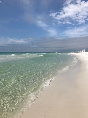 On the beach, sun-loungers