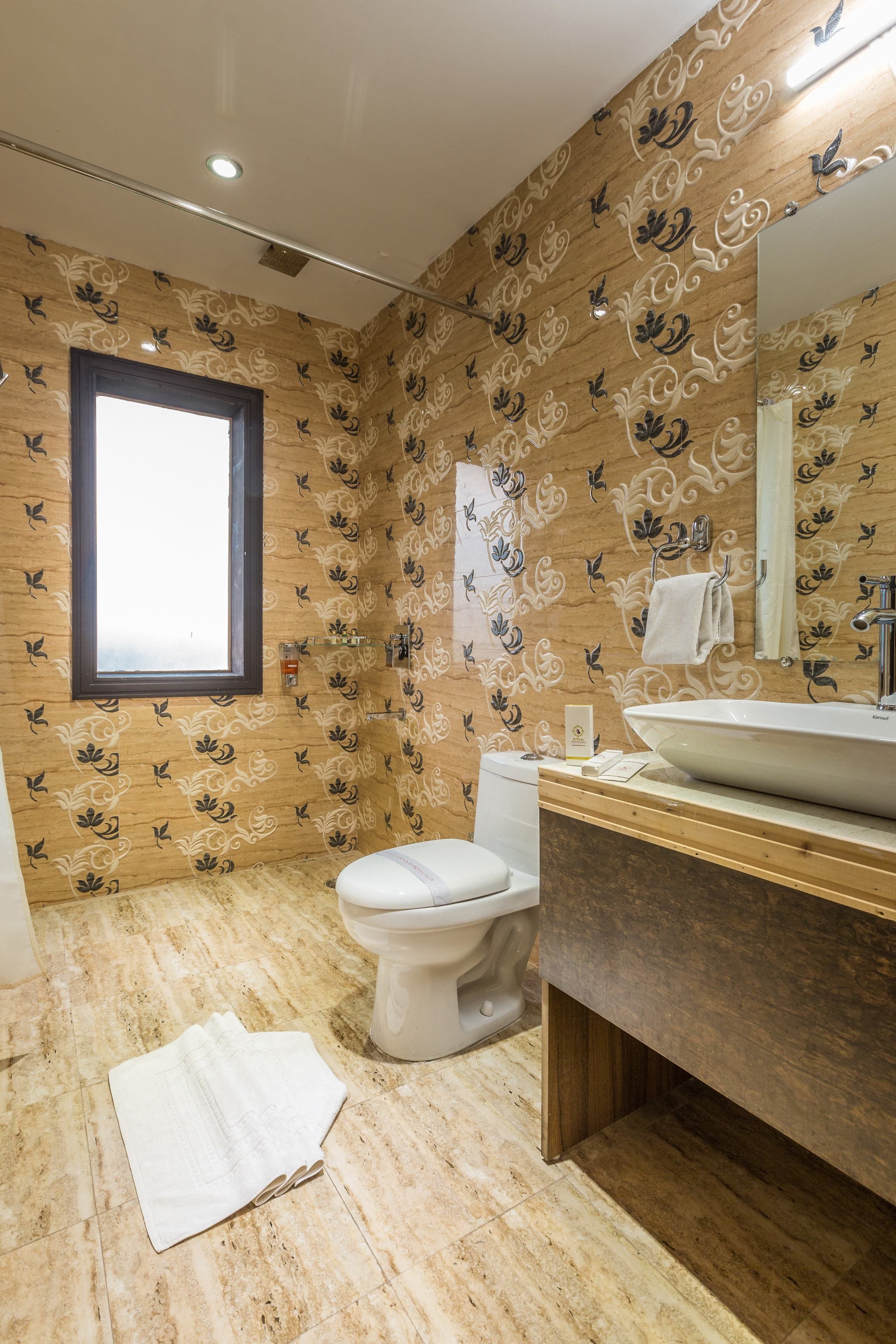 deluxe room | bathroom | free toiletries, hair dryer, slippers, towels