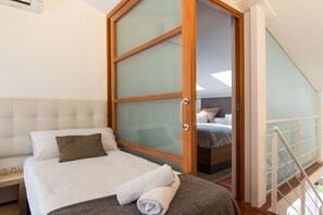 2 slaapkamers, een strijkplank/strijkijzer, reisbedje, gratis wifi