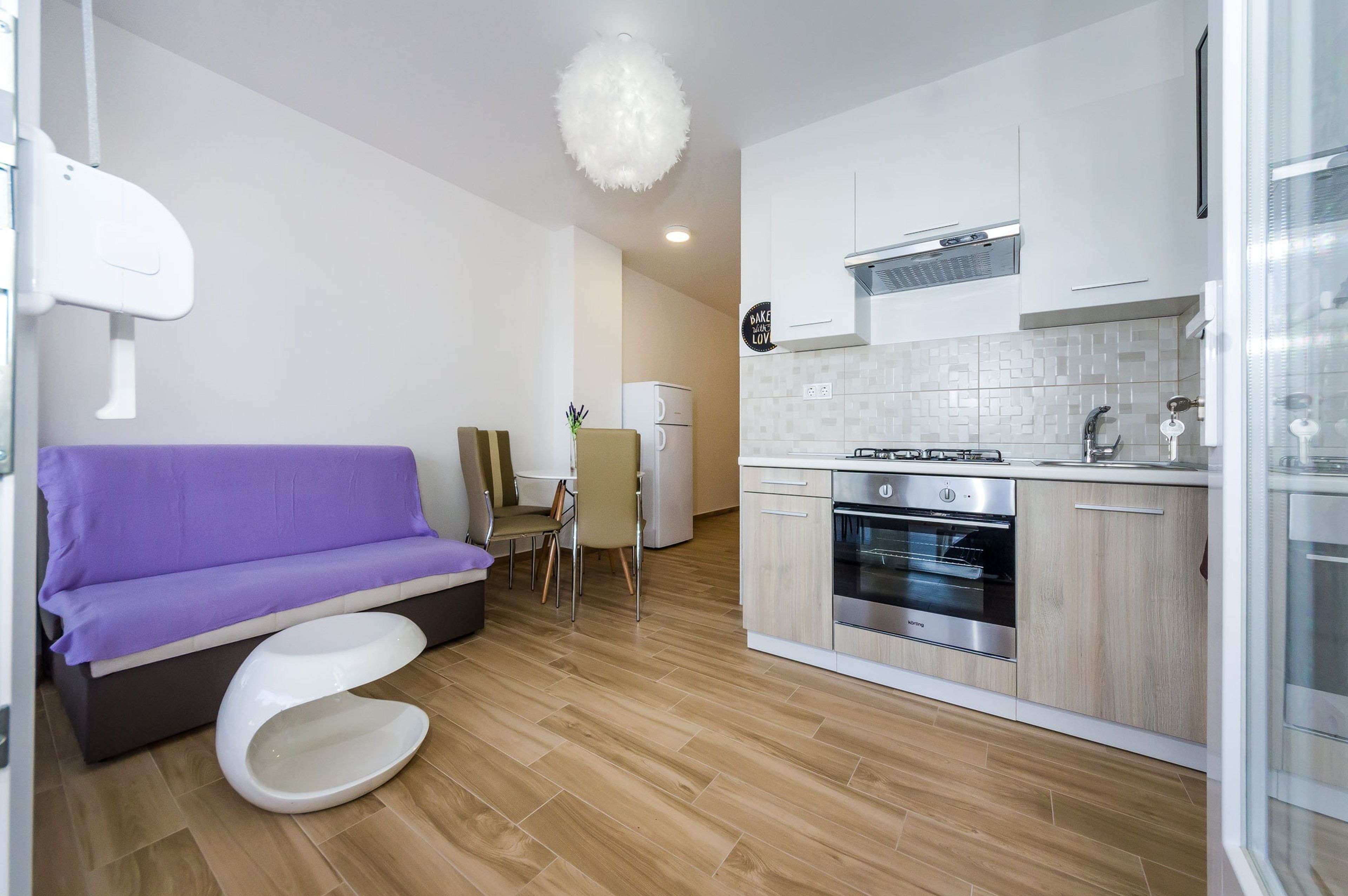 Superior-Apartment, 1 Schlafzimmer, Terrasse, Meerblick | Wohnbereich | Flachbildfernseher