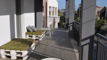 Deluxe driepersoonskamer | Terras