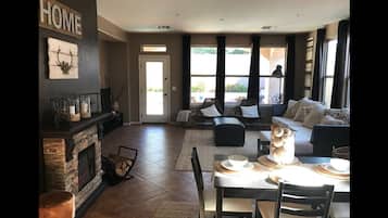 Deluxe House, 3 Bedrooms | Living area | Flat-screen TV, fireplace, DVD player, first-run movies