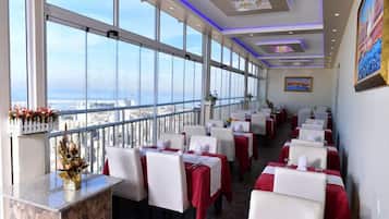 Breakfast, lunch, dinner served; local and international cuisine