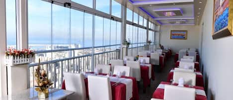 Breakfast, lunch, dinner served; local and international cuisine