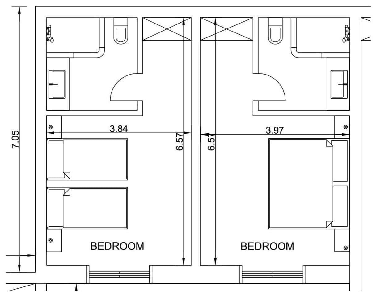 Grundriss eines Hotelzimmers mit zwei Schlafzimmern, die 3,84 bzw. 3,97 Meter breit sind, sowie einem Badezimmerbereich mit einer Breite von 6,57 Metern.