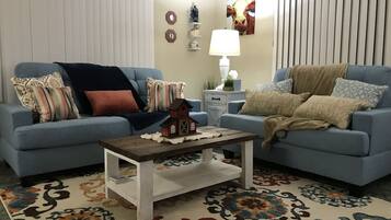 Premium Condo, 1 Bedroom, Kitchen (Unit W7) | Living room | Flat-screen TV, pay films