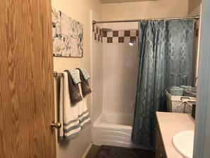 Premium Condo, 1 Bedroom, Kitchen (Unit E8) | Bathroom | Combined shower/bathtub, free toiletries, towels - Parkway Suites (West Valley City)