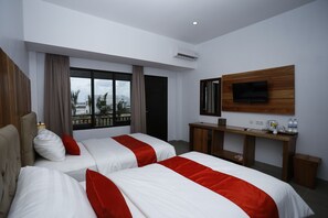 Premium bedding, pillowtop beds, desk, blackout drapes