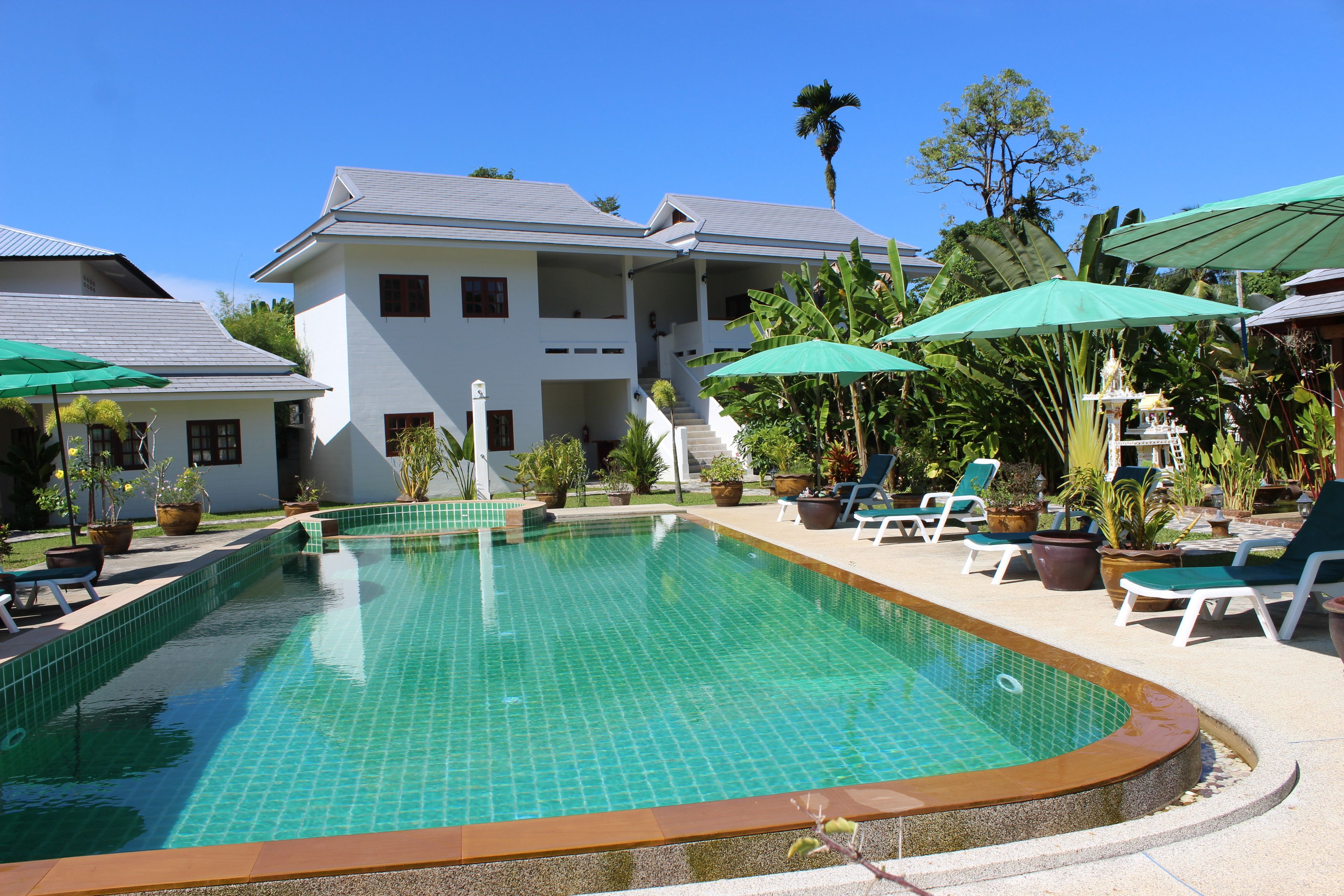 Outdoor pool, pool umbrellas, pool loungers