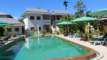 Outdoor pool, pool umbrellas, pool loungers