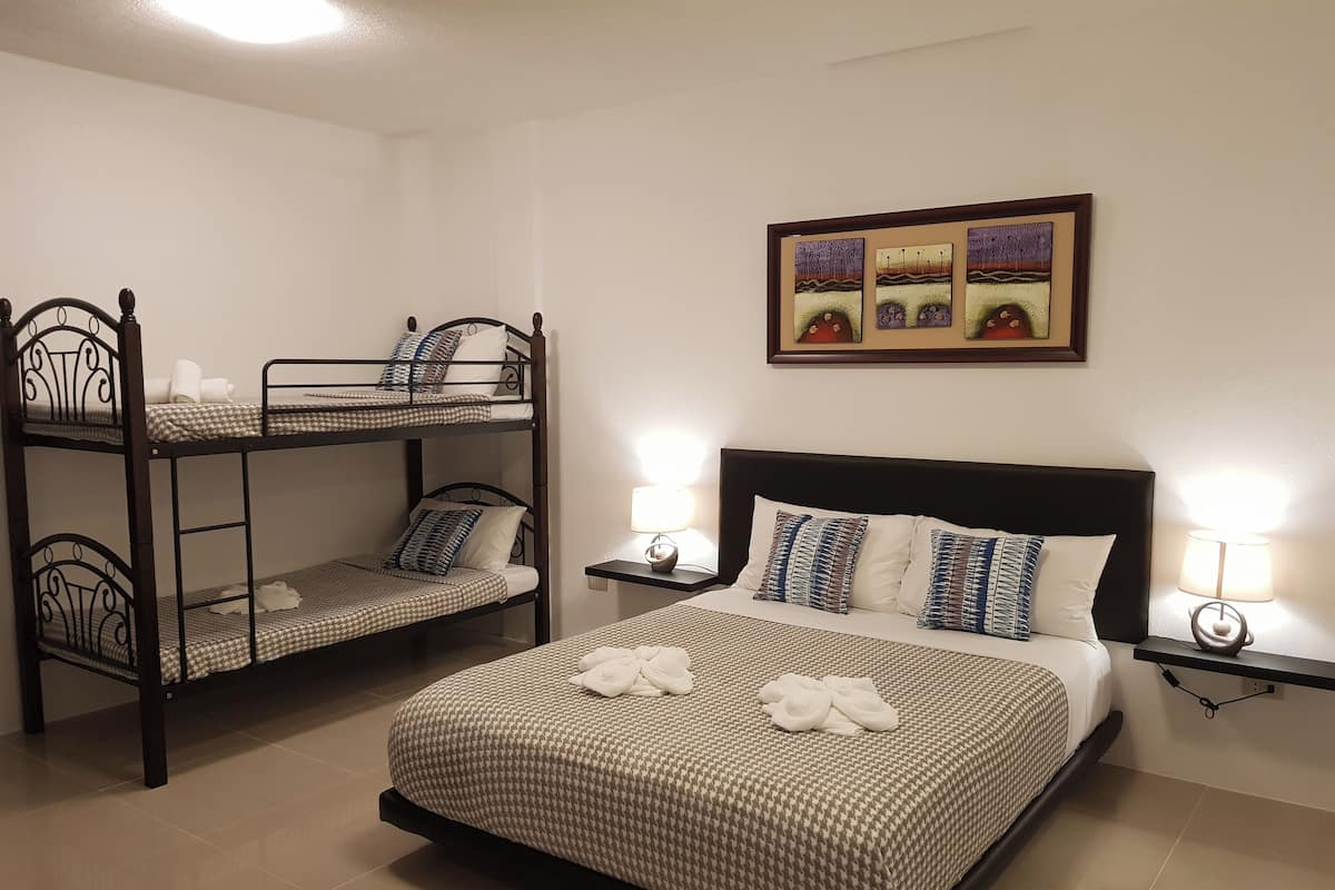 Family Room | In-room safe, desk, free WiFi, bed sheets