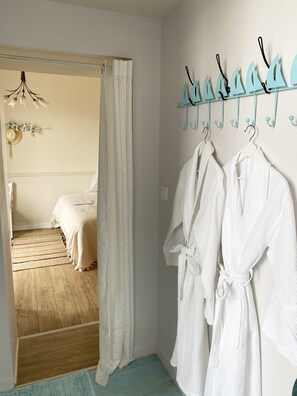 Deluxe Double Room, 1 King Bed (The Ashley Morgan) | Bathroom | Shower, rainfall showerhead, hair dryer, slippers