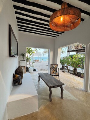 Basic Quadruple Room | Terrace/patio - Mango Beach house (Jambiani)