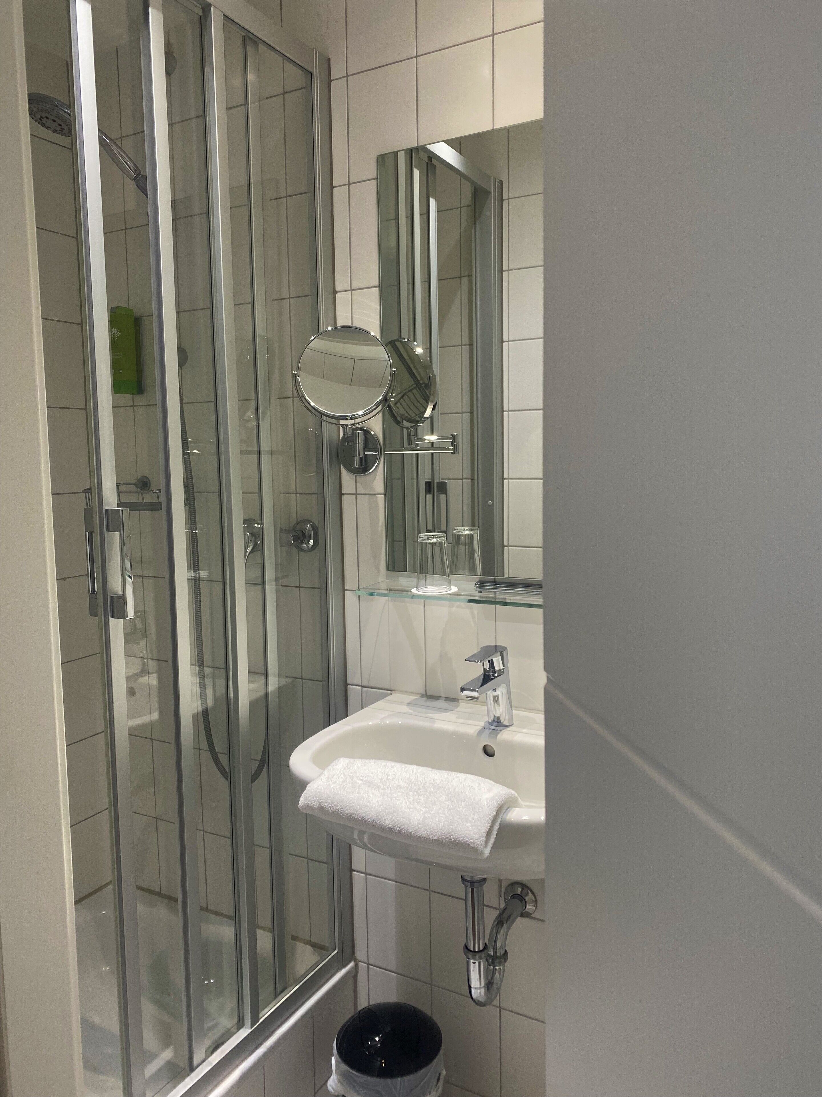 shower, free toiletries, hair dryer, towels